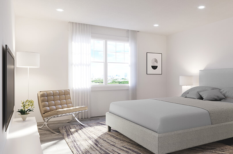 River’s Edge Bracebridge condo bedroom with neutral tones and natural light